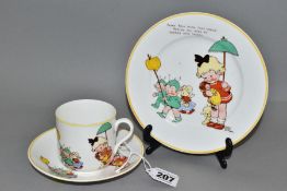 A SHELLEY MABEL LUCIE ATTWELL TRIO comprising cup, saucer and side plate, matching motto and