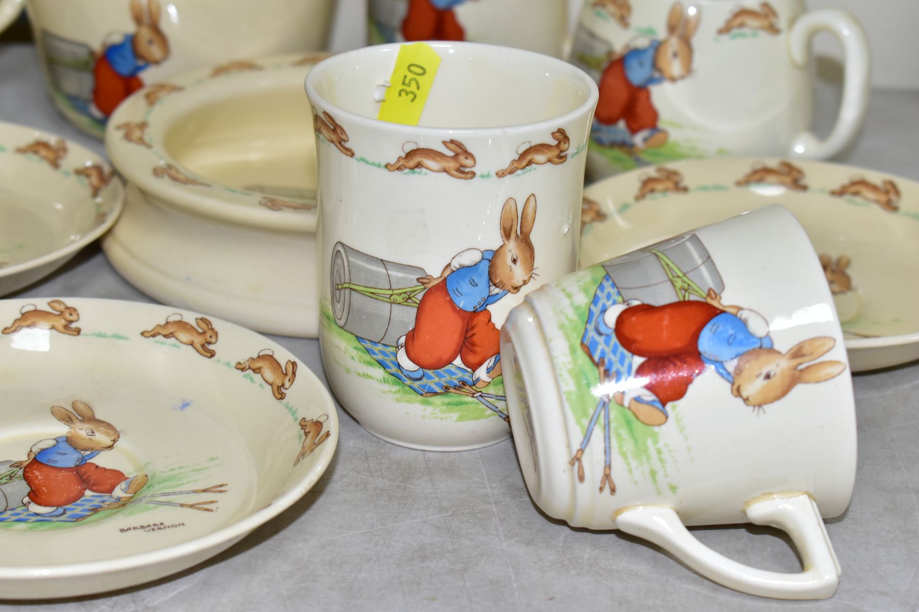 THIRTEEN PIECES OF ROYAL DOULTON BUNNYKINS EARTHENWARE TABLEWARES OF PRESSING TROUSERS SCENE HW14 BY - Image 2 of 13