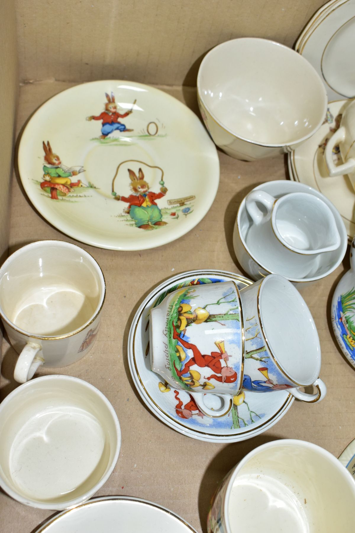 A BOX OF ASSORTED CHILDRENS CERAMIC TEAWARES, etc, including a Foley China mug printed and tinted - Image 4 of 8