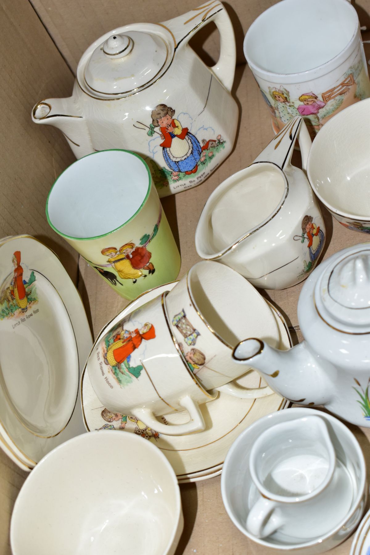 A BOX OF ASSORTED CHILDRENS CERAMIC TEAWARES, etc, including a Foley China mug printed and tinted - Image 2 of 8