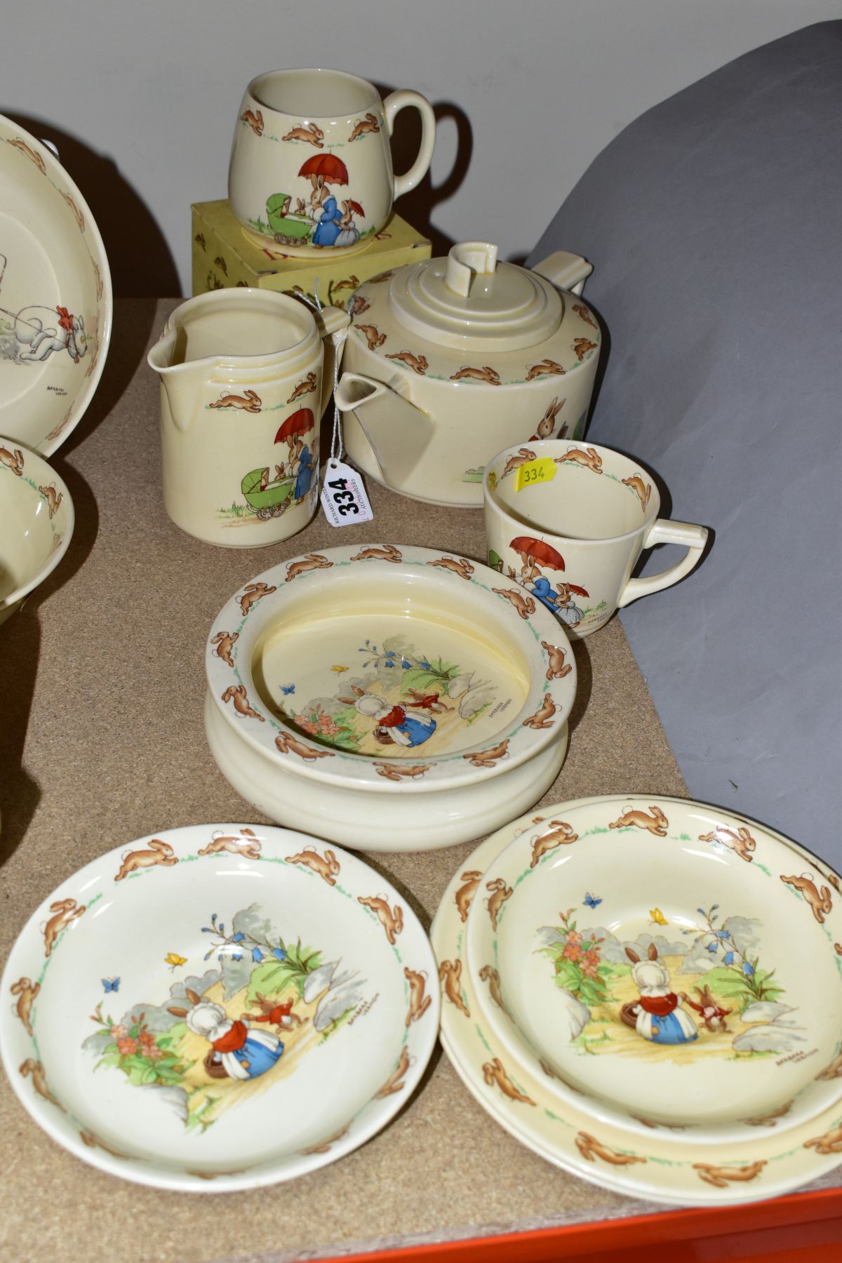 NINE PIECES OF ROYAL DOULTON BUNNYKINS EARTHENWARE TABLEWARES OF SCENES BY BARBARA VERNON,