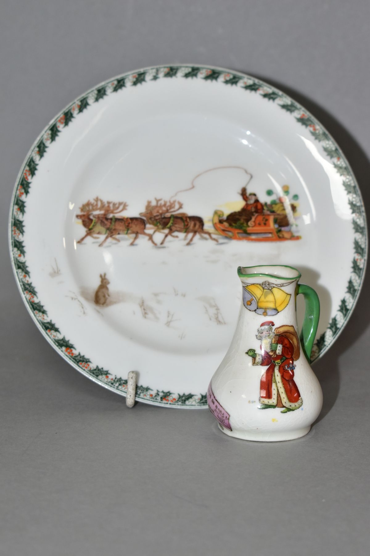 TWO PIECES OF ROYAL DOULTON CHRISTMAS - SANTA CLAUS SERIES WARE, comprising miniature jug no 5,