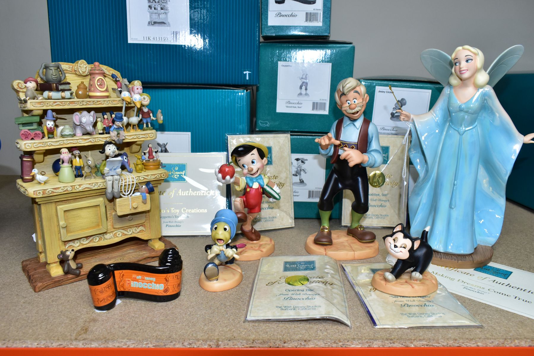 SEVEN BOXED WALT DISNEY CLASSICS COLLECTION PINOCCHIO FIGURES, comprising Making Dreams Come True,