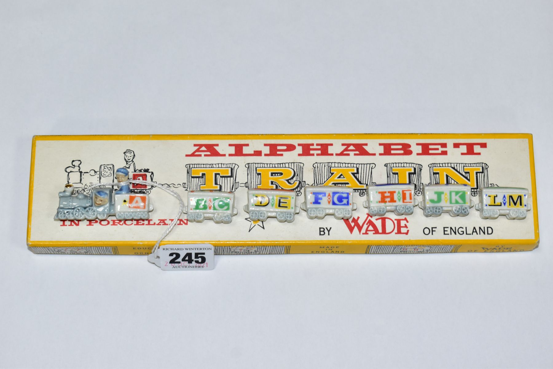 A BOXED WADE ALPHABET TRAIN, 1958-59, comprising of engine, tender and six carriages (Condition
