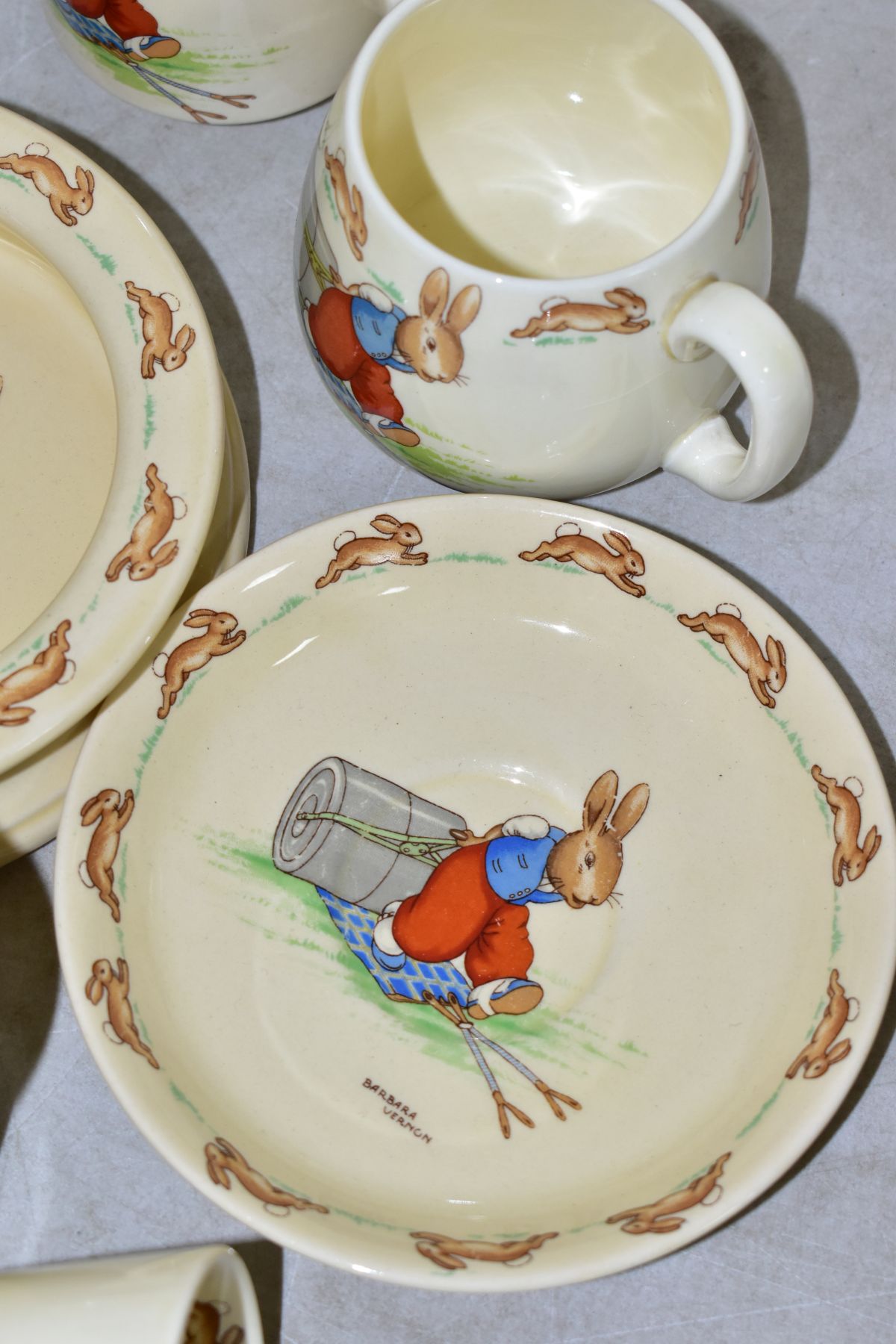 THIRTEEN PIECES OF ROYAL DOULTON BUNNYKINS EARTHENWARE TABLEWARES OF PRESSING TROUSERS SCENE HW14 BY - Image 6 of 13