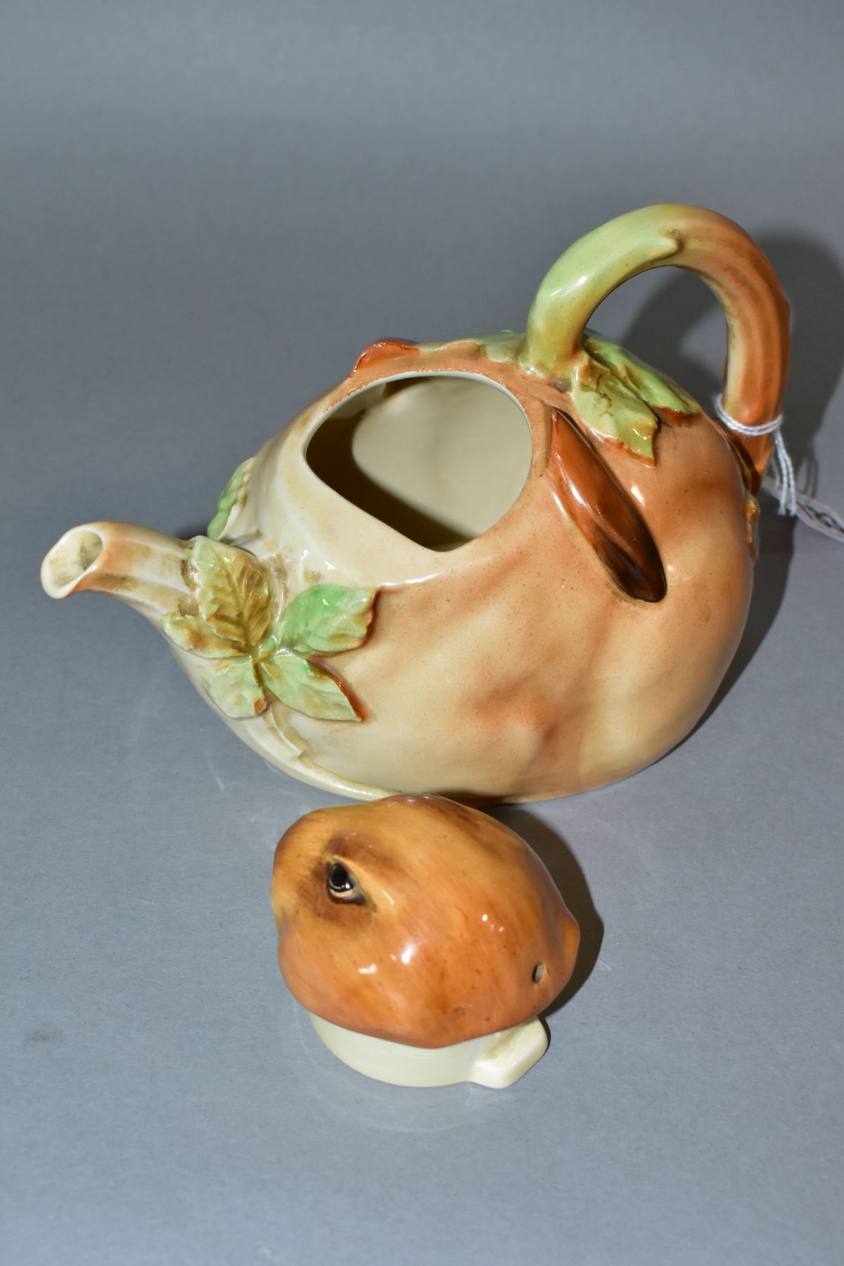 A 1930'S/40'S ROYAL DOULTON BUNNYKINS EARTHENWARE TEAPOT, D6010, designed by Charles Noke, shaped as - Image 4 of 5