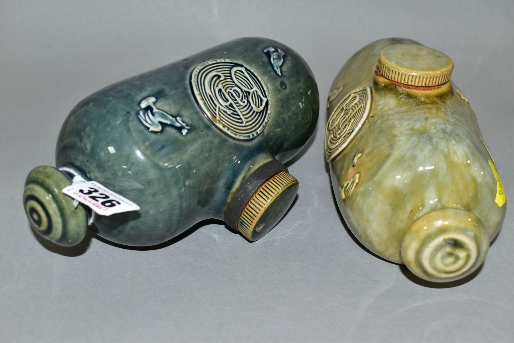 TWO ROYAL DOULTON STONEWARE 'BABY' HOT WATER BOTTLES, from nursery ware series, c.1910, both with - Image 4 of 4