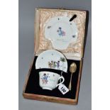 A CASED ROYAL DOULTON CHINA NURSERY RHYMES L SERIES WARE TRIO AND HALLMARKED SILVER TEASPOON, the