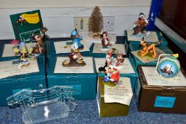 A GROUP OF WALT DISNEY CLASSICS CHRISTMAS ORNAMENTS, comprising four boxed Mickey's Christmas