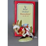 A ROYAL DOULTON TOUCHDOWN BUNNYKINS DB100, seventh variation (University of Indiana), white and red,