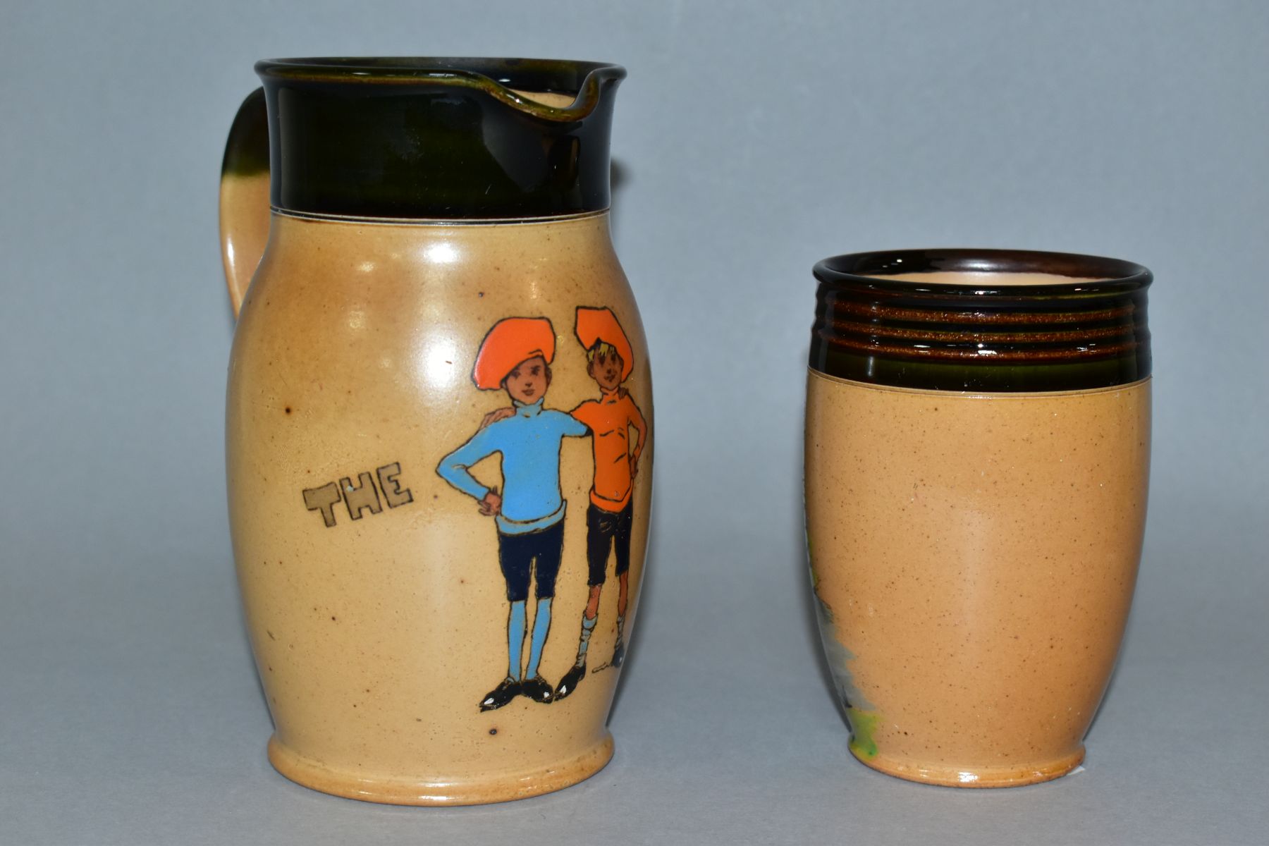 TWO EARLY 20TH CENTURY ROYAL DOULTON LAMBERTH STONEWARE ITEMS FROM THE TWINS SERIES WARE by John - Image 2 of 4