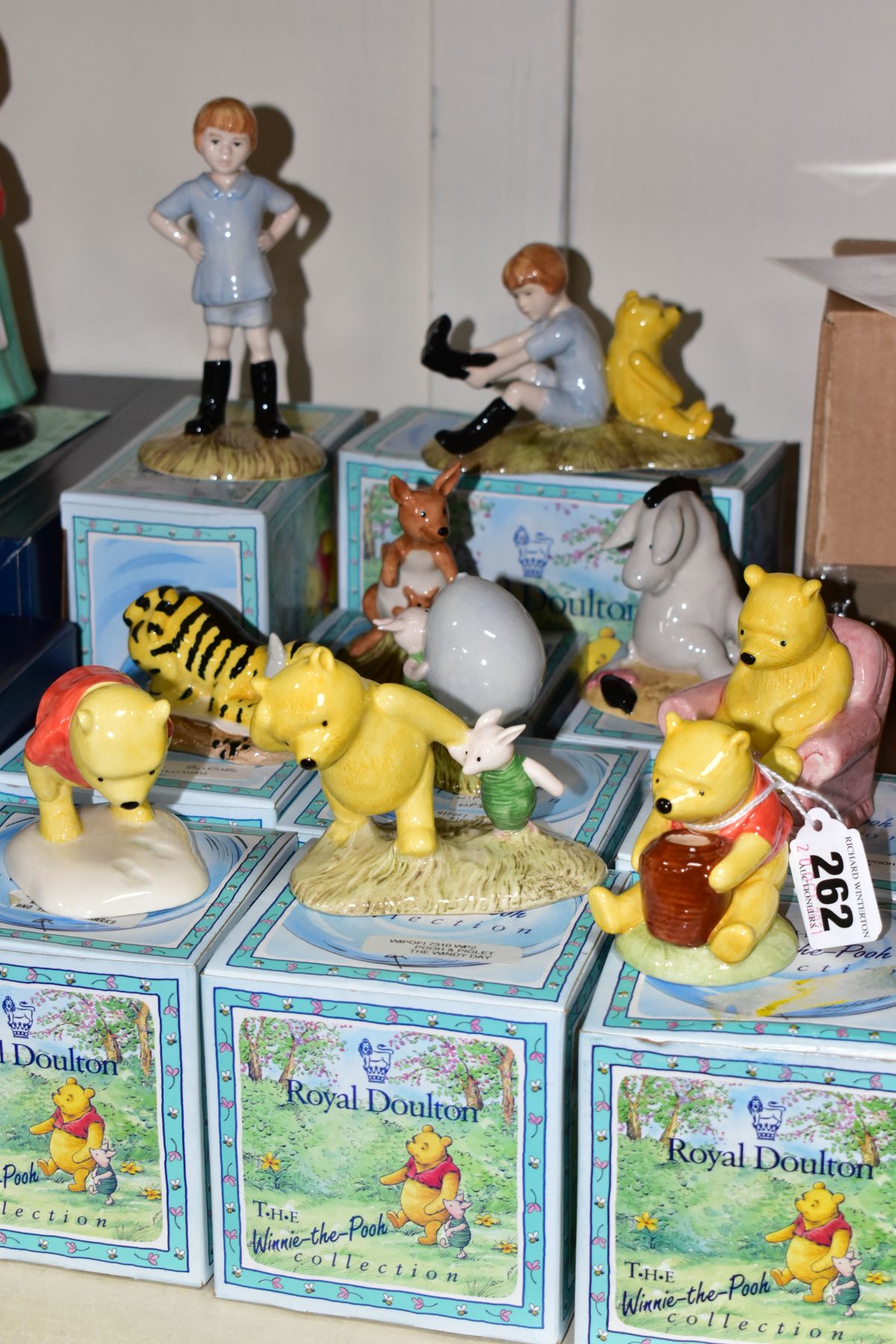 TEN BOXED ROYAL DOULTON FIGURES CELEBRATING 70 YEARS OF WINNIE THE POOH, comprising Winnie The