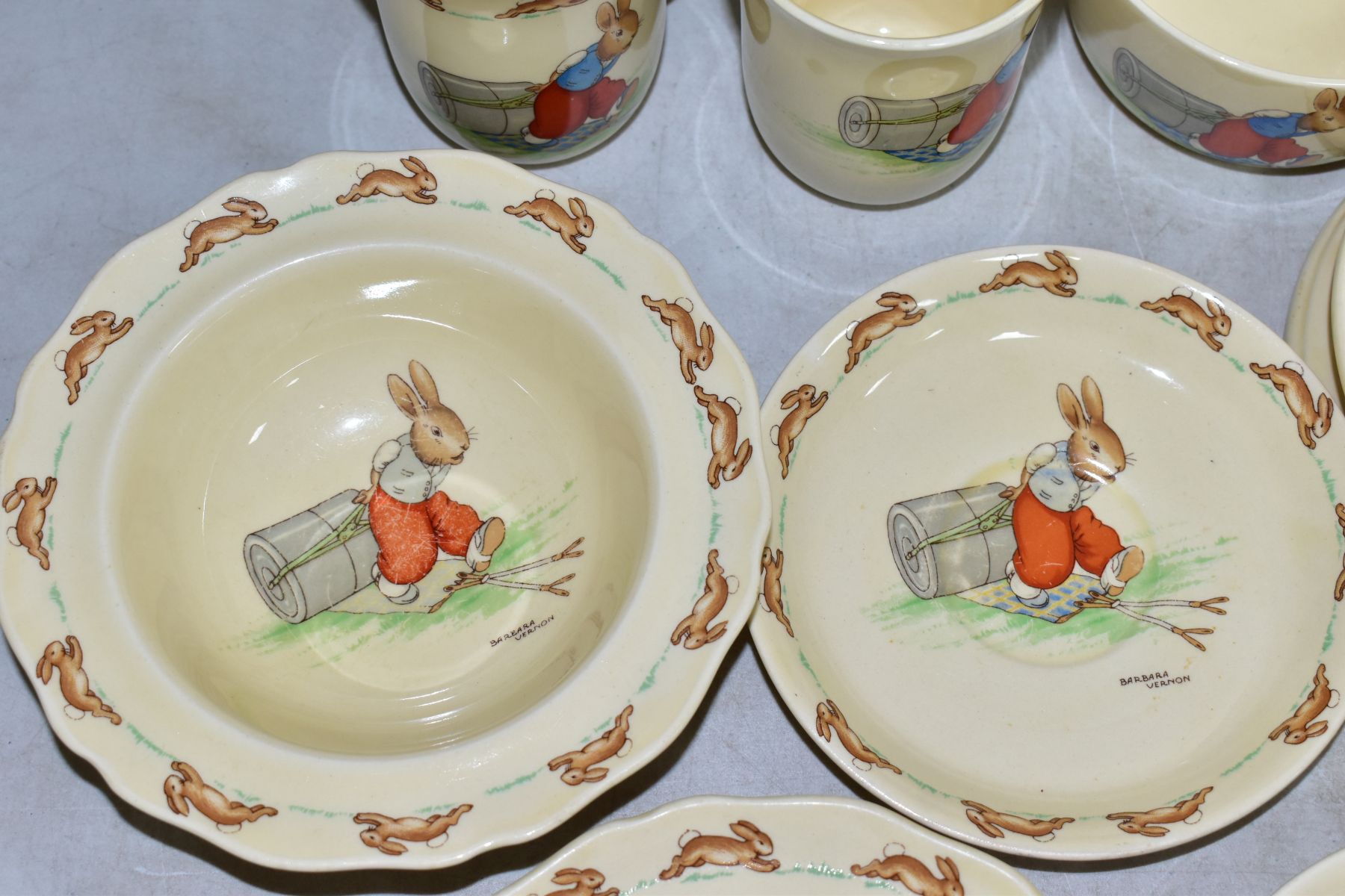 THIRTEEN PIECES OF ROYAL DOULTON BUNNYKINS EARTHENWARE TABLEWARES OF PRESSING TROUSERS SCENE HW14 BY - Image 4 of 13