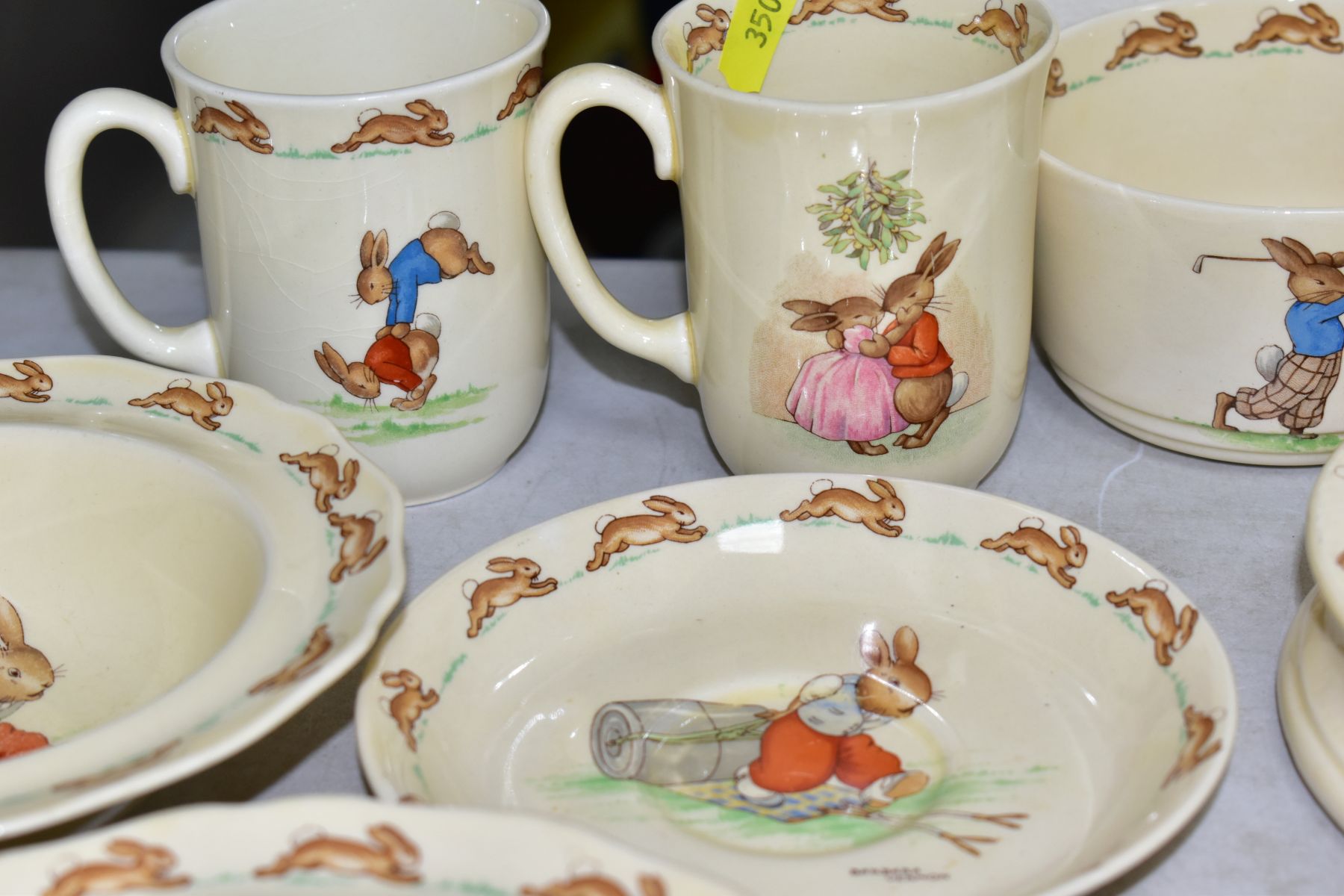 THIRTEEN PIECES OF ROYAL DOULTON BUNNYKINS EARTHENWARE TABLEWARES OF PRESSING TROUSERS SCENE HW14 BY - Image 12 of 13