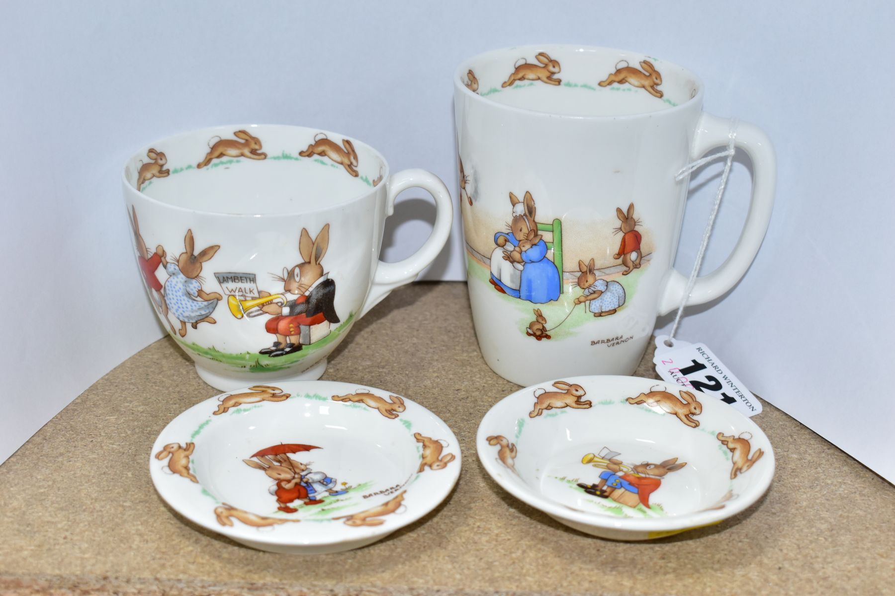 FOUR PIECES OF ROYAL DOULTON BUNNYKINS WHITE BONE CHINA DESIGNED BY BARBARA VERNON, comprising a tea