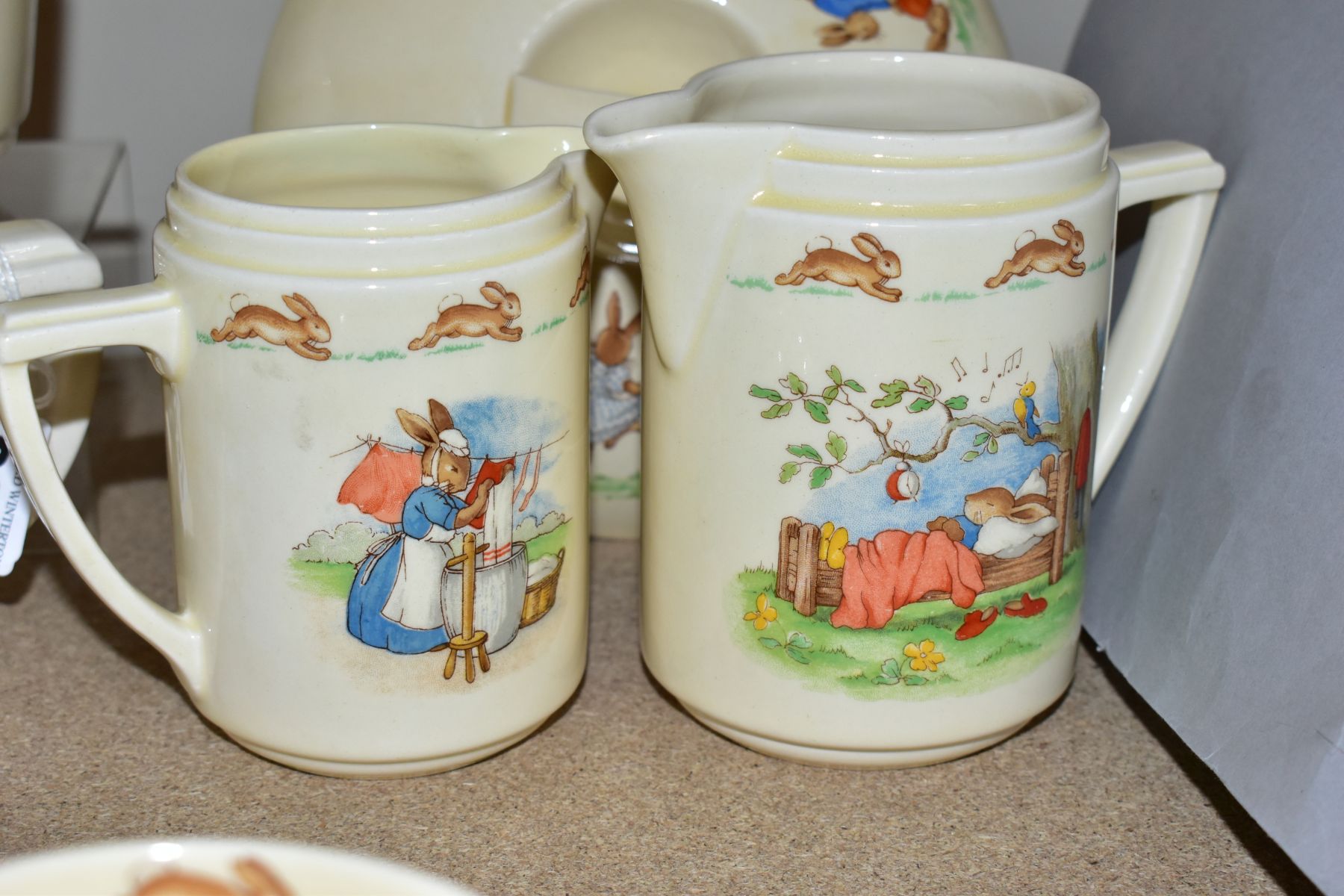 TWELVE PIECES OF ROYAL DOULTON BUNNYKINS EARTHENWARE TABLEWARES OF SCENES BY BARBARA VERNON, - Image 11 of 14