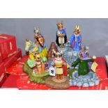 A SET OF SEVEN BOXED ROYAL DOULTON BUNNYKINS FIGURES AND STAND FROM THE ARTHURIAN LEGENDS