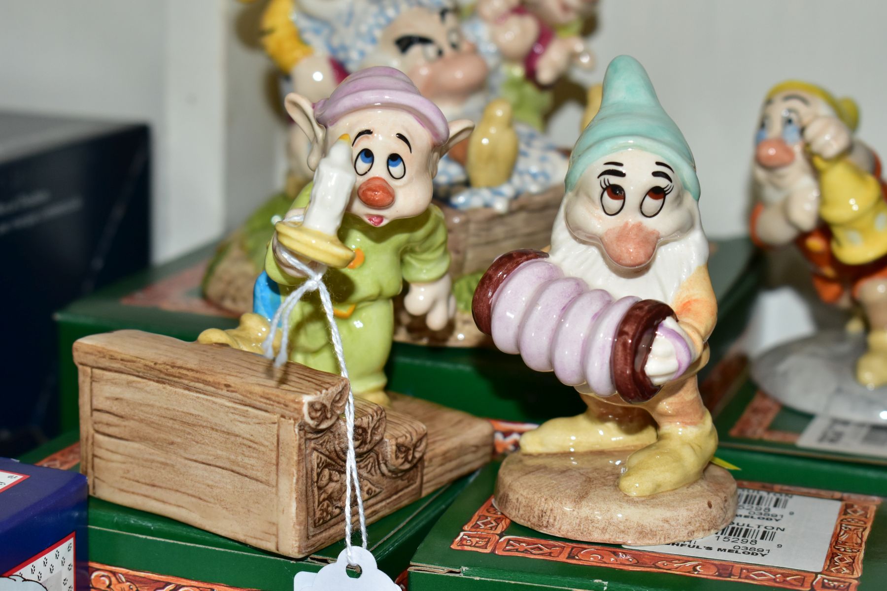 FOUR BOXED ROYAL DOULTON FIGURES FROM SNOW WHITE AND THE SEVEN DWARFS, comprising Dopey by - Image 2 of 5