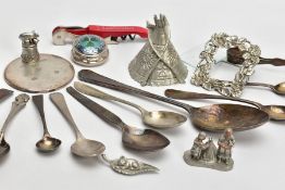 A TIN OF ASSORTED SILVER AND WHITE METAL ITEMS, to include a silver lined circular mirror,