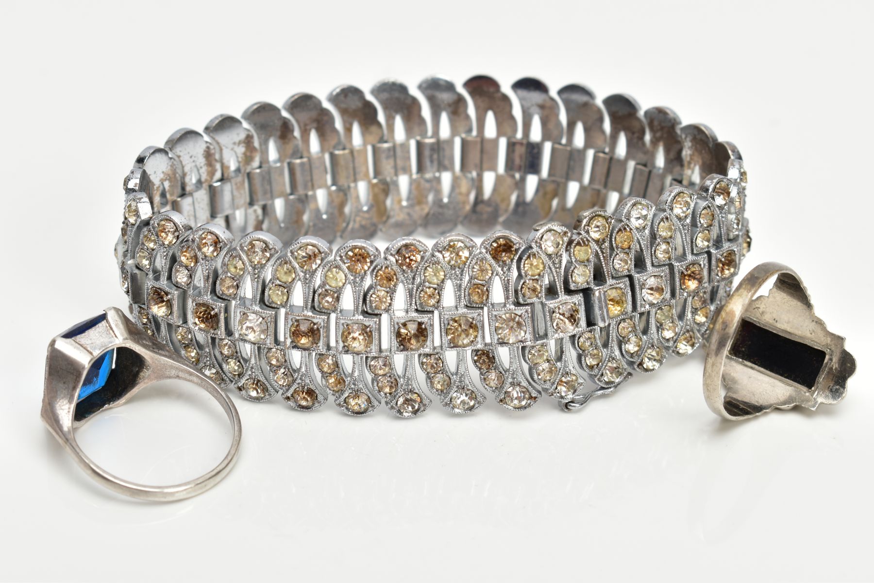 A WHITE METAL BRACELET AND TWO WHITE METAL RINGS, the wide articulated bracelet of an art deco - Image 4 of 4