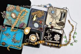 A SELECTION OF COSTUME JEWELLERY, to include a silver sweetheart brooch, of a flower shape,