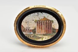 A VICTORIAN MICRO MOSAIC BROOCH, of an oval form, depicting the temple of Hercules by a fountain,