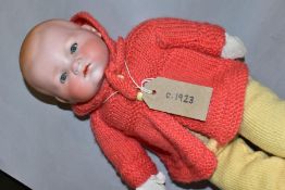 AN ARMAND MARSIELLE BISQUE HEAD BABY DOLL, nape of neck marked 'A M Germany 341./4.', sleeping eyes,