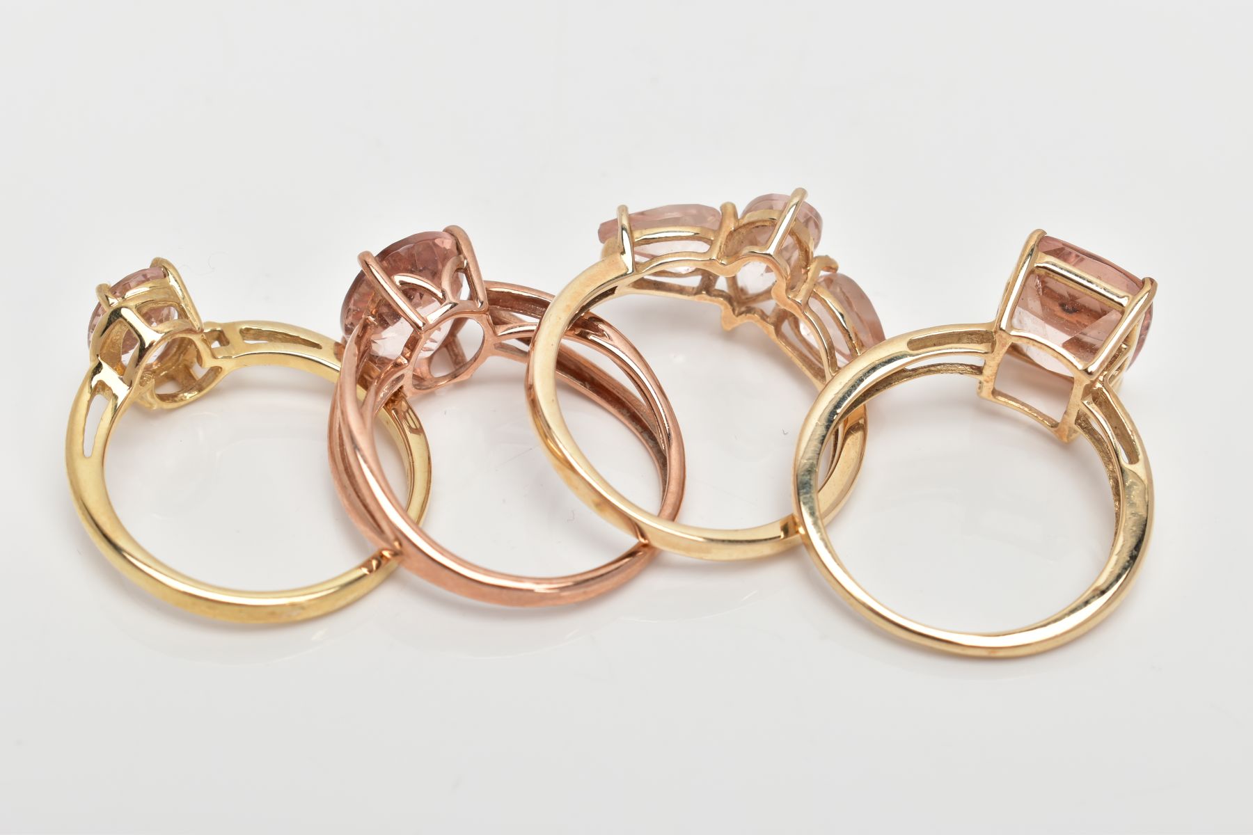 FOUR 9CT GOLD MORGANITE SET DRESS RINGS, each of various designs, set with vary cut morganite, one - Image 3 of 3