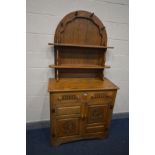 AN OAK DRESSER, with two drawers, width 94cm x depth 43cm x height 180cm x height of base 92cm
