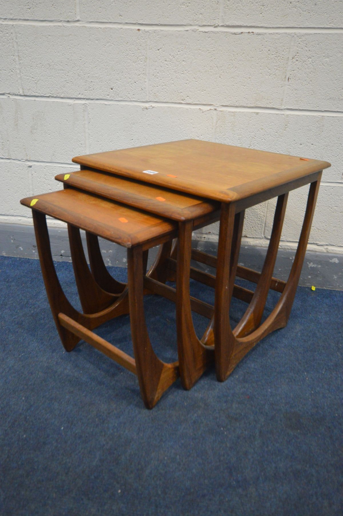 A G PLAN FRESCO TEAK NEST OF THREE TABLES (condition:- fluid stains to each table)