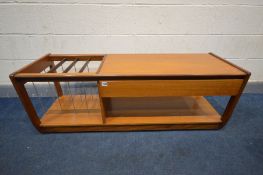 A MID 20TH CENTURY TEAK MULTI PURPOSE COFFEE TABLE, with a single drawer, shelving and a spindled