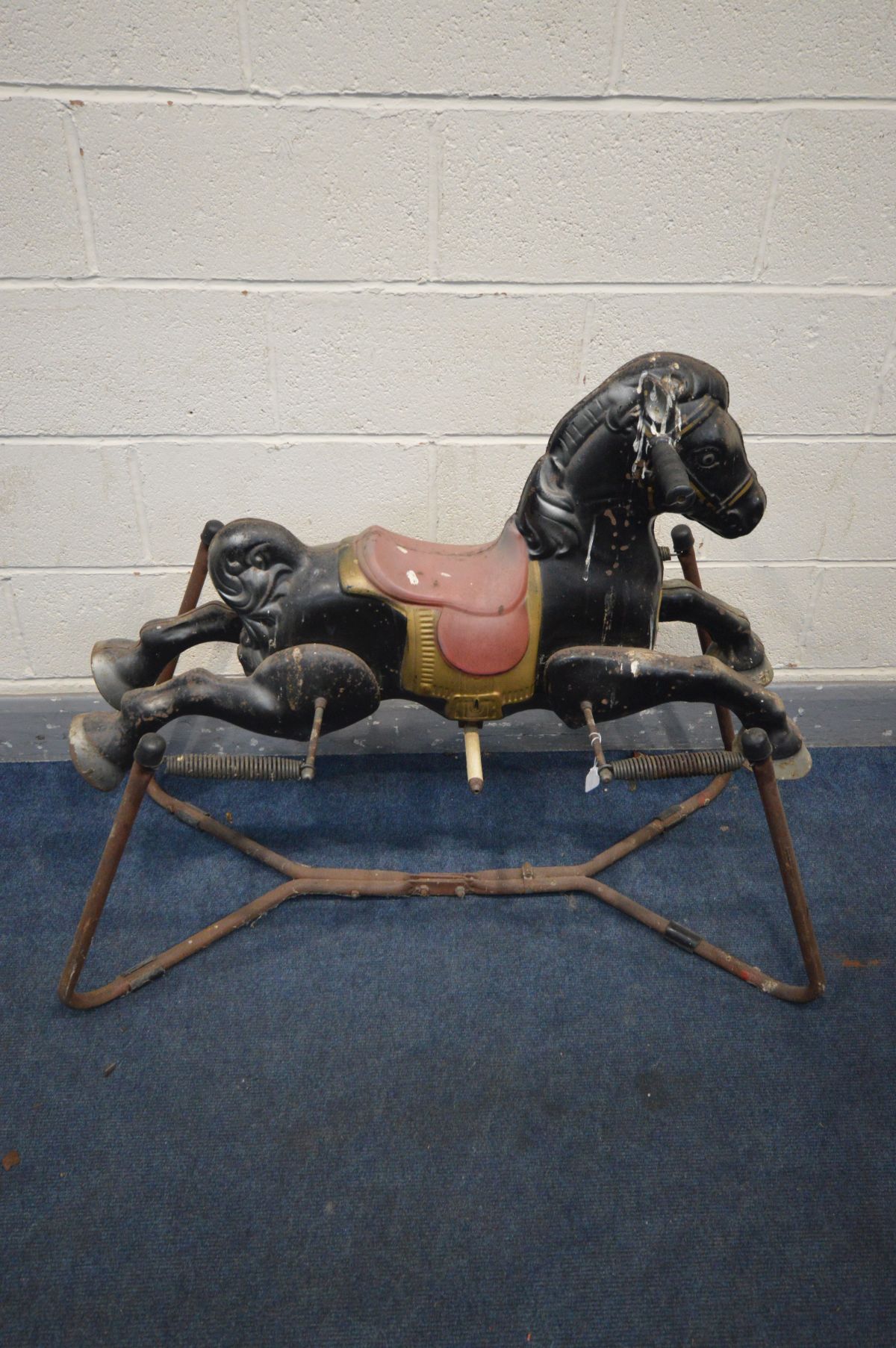 A VINTAGE MOBO TOYS SPRUNG HORSE ROCKER, height 90cm and metal framed folding plastic children's