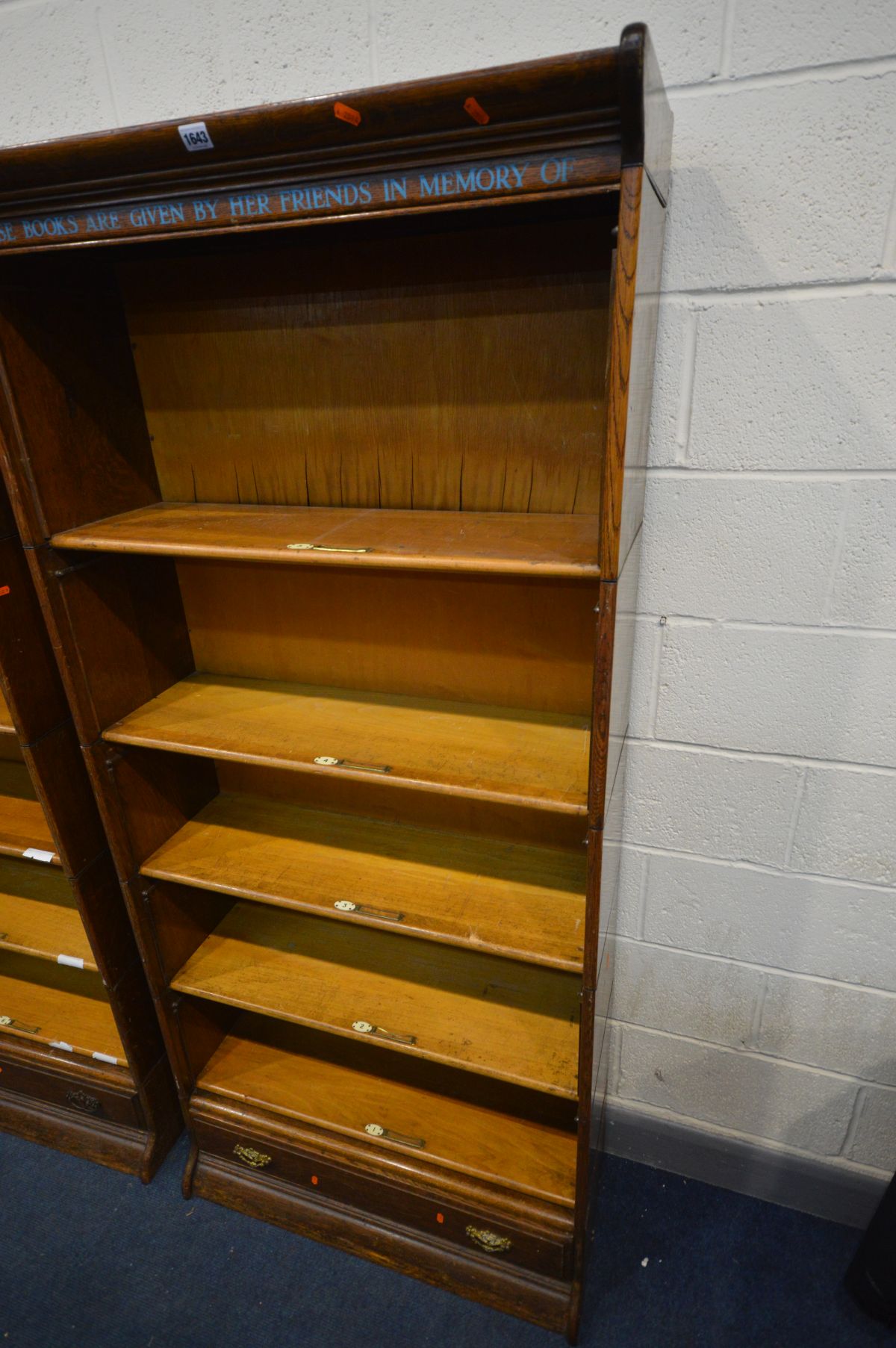 AN OAK FIVE SECTION BOOKCASE, with stencilled writing to top frieze, the bottom section with a - Image 2 of 3