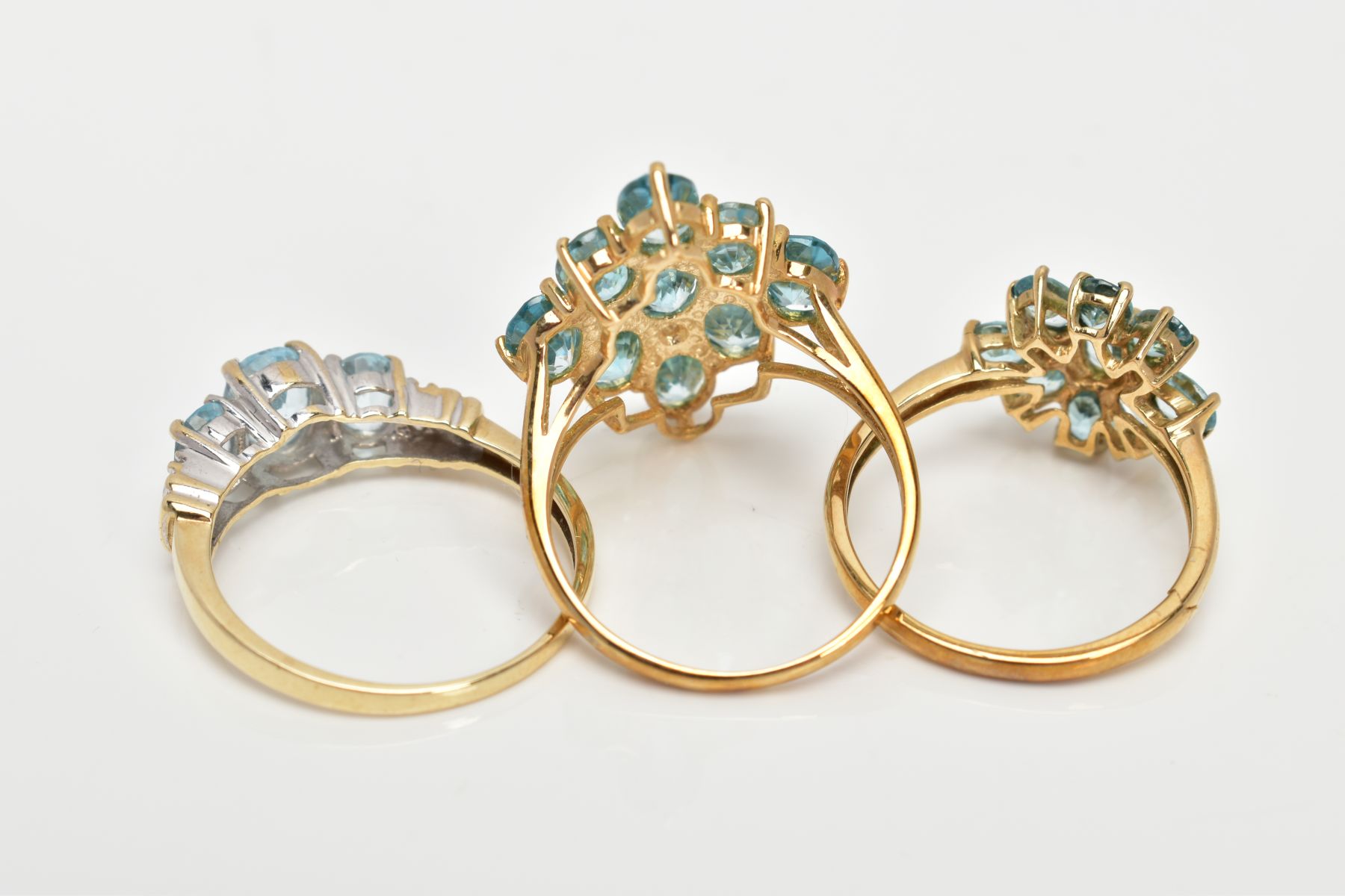 THREE 9CT GOLD BLUE TOPAZ DRESS RINGS, two designed as clusters, ring sizes O, hallmarked 9ct gold - Image 3 of 3