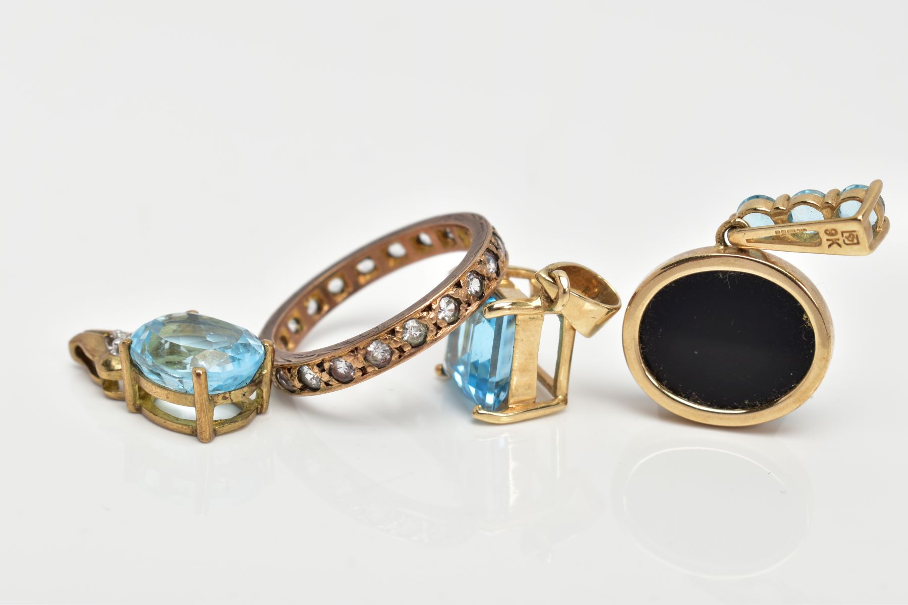 THREE 9CT GOLD GEM SET PENDANTS AND A YELLOW METAL FULL ETERNITY RING, the first pendant set with an - Image 4 of 4