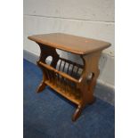 AN ERCOL GOLDEN DAWN MAGAZINE RACK