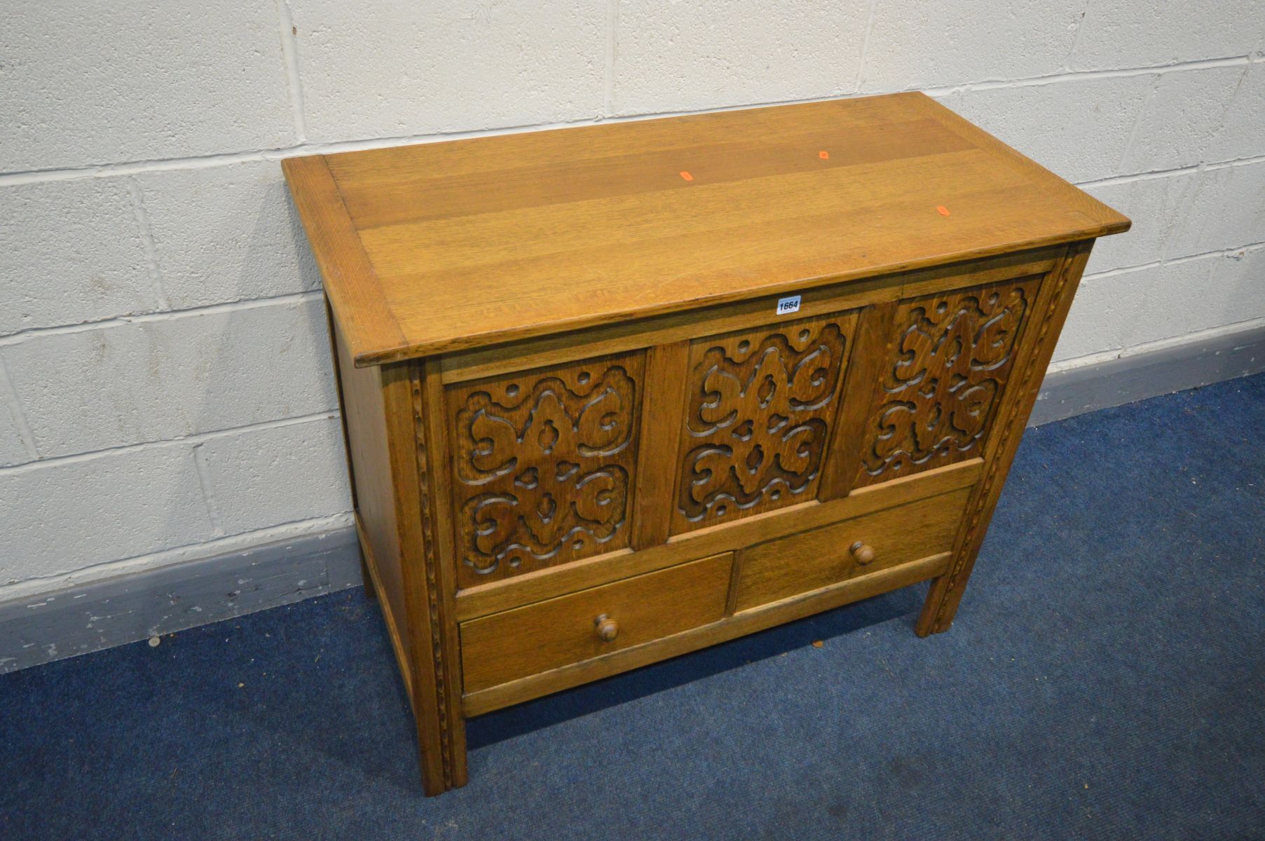A 'HEATHLAND FURNITURE' OAK MULE CHEST, with blind fretwork detailing to the three front panels - Image 2 of 3