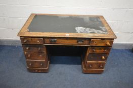 A VICTORIAN MAHOGANY PEDESTAL DESK, green leather inlay to top, a long central drawer flanked by two