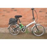 AN APOLLO TRANSITION FOLDING BIKE with 6 speed twist grip gears, max seat height 32in