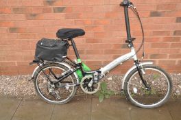 AN APOLLO TRANSITION FOLDING BIKE with 6 speed twist grip gears, max seat height 32in