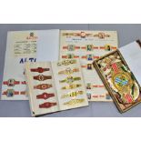 A COLLECTION OF VINTAGE CIGAR BANDS, mainly Dutch, stuck in two albums, with a quantity of loose