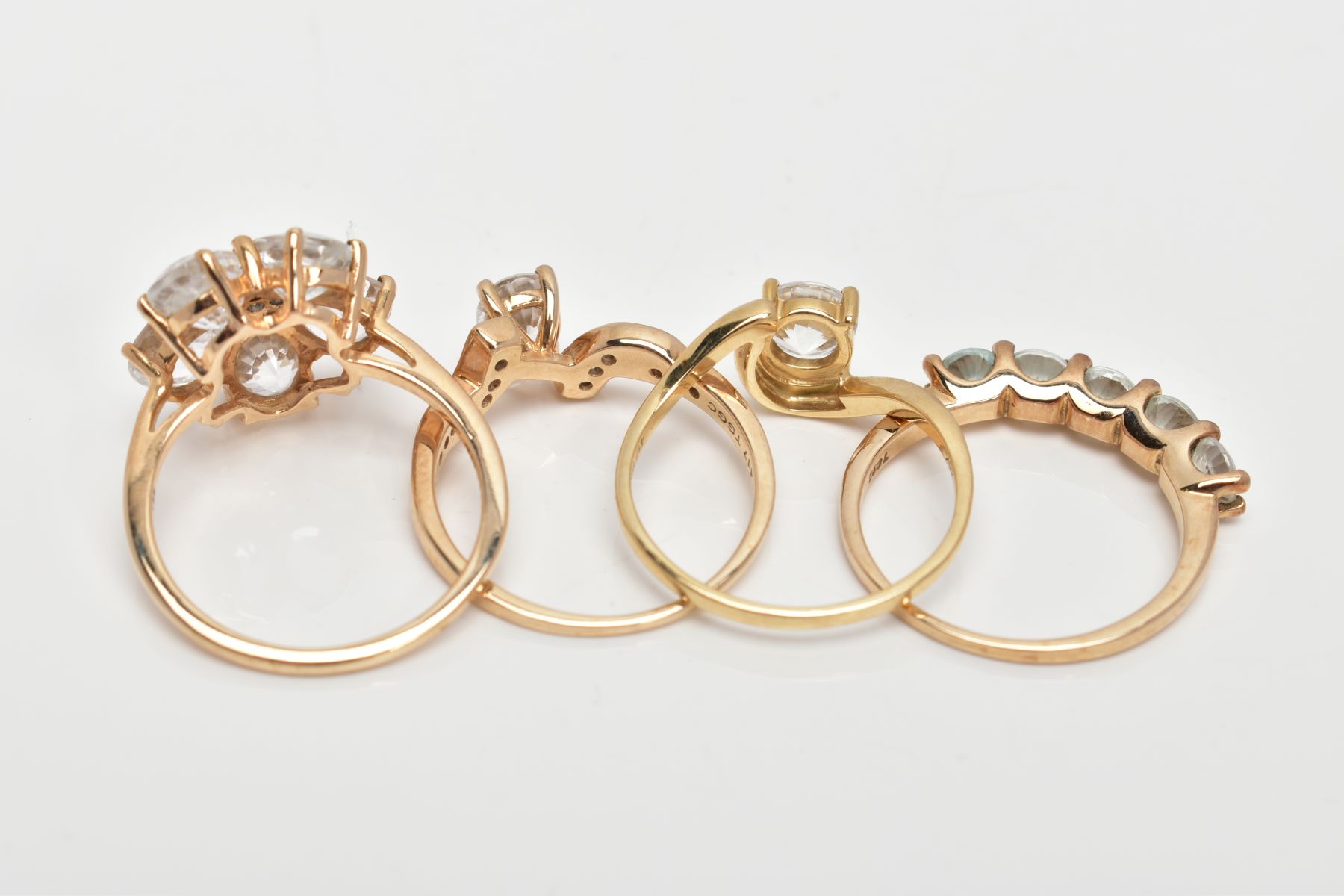 FOUR 9CT GOLD COLOURLESS ZIRCON SET DRESS RINGS, each with a 9ct gold hallmark for Birmingham, - Image 3 of 3