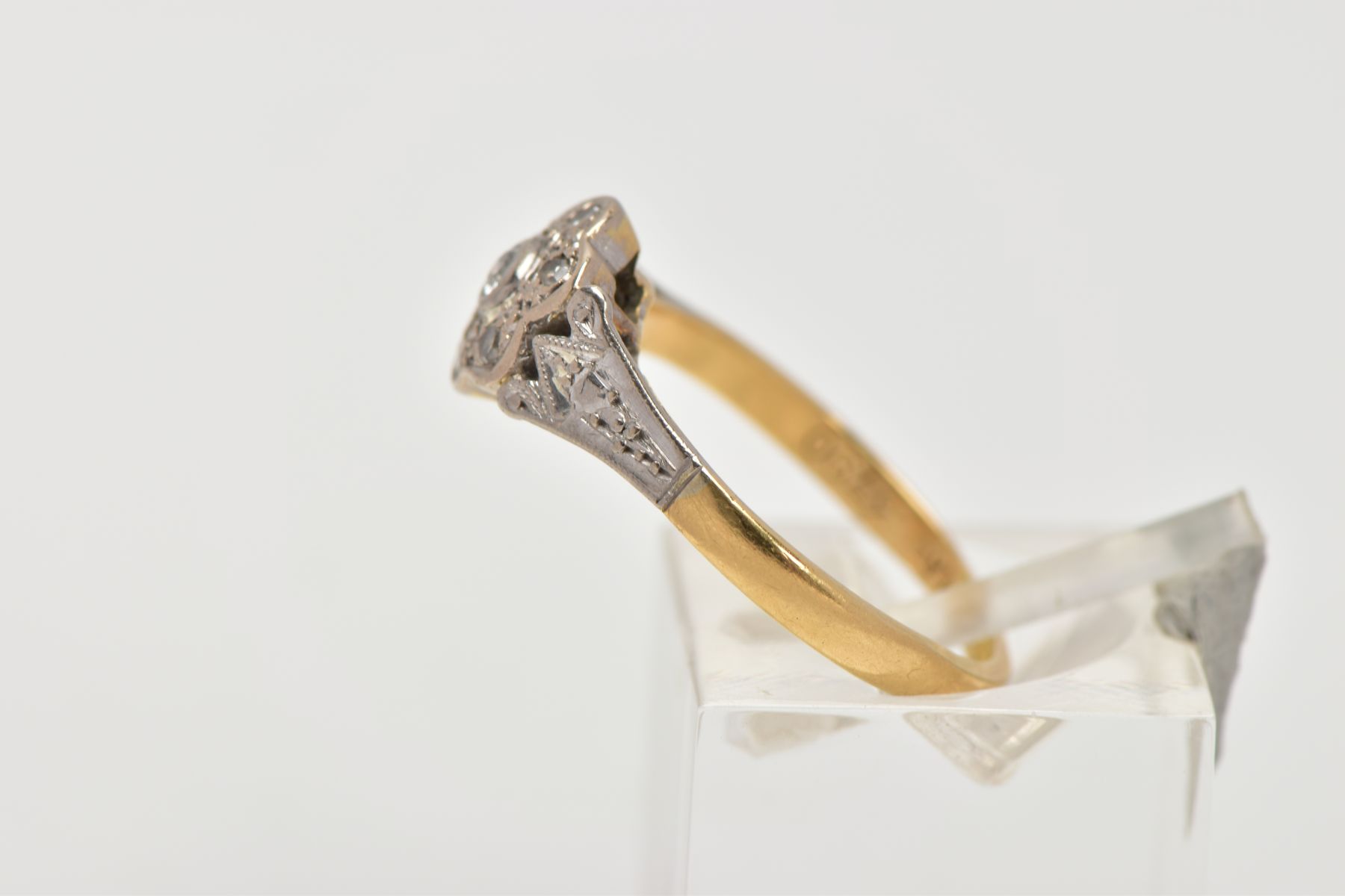 AN 18CT GOLD AND PLATINUM DIAMOND CLUSTER RING, the cluster of a flower shape, set with a central - Image 2 of 4