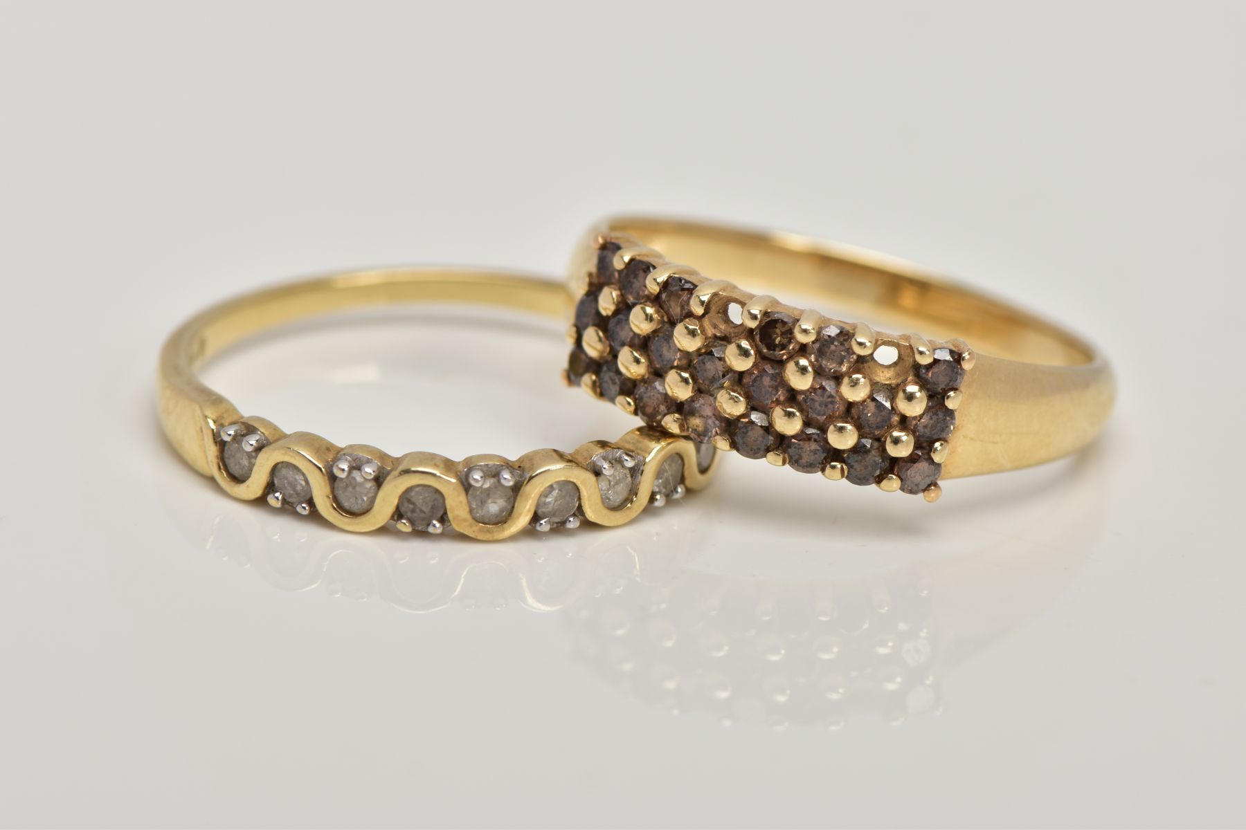 TWO 9CT GOLD DIAMOND SET RINGS, the first a half eternity ring set with a row of single cut - Image 2 of 3