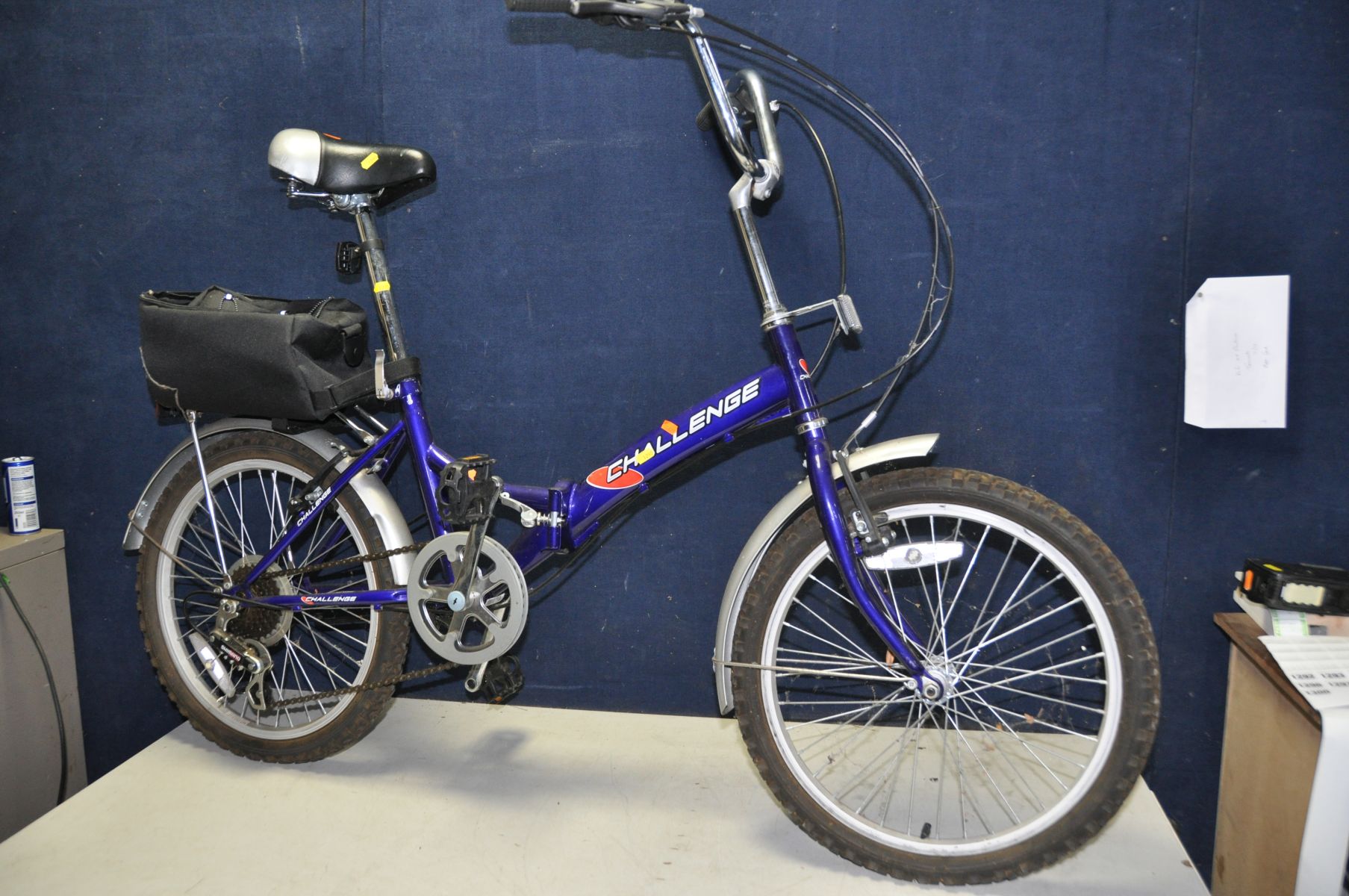 A CHALLENGE TORNADO FOLDING BIKE with 6 speed grip shift Shimano gears, 20in wheels min seat