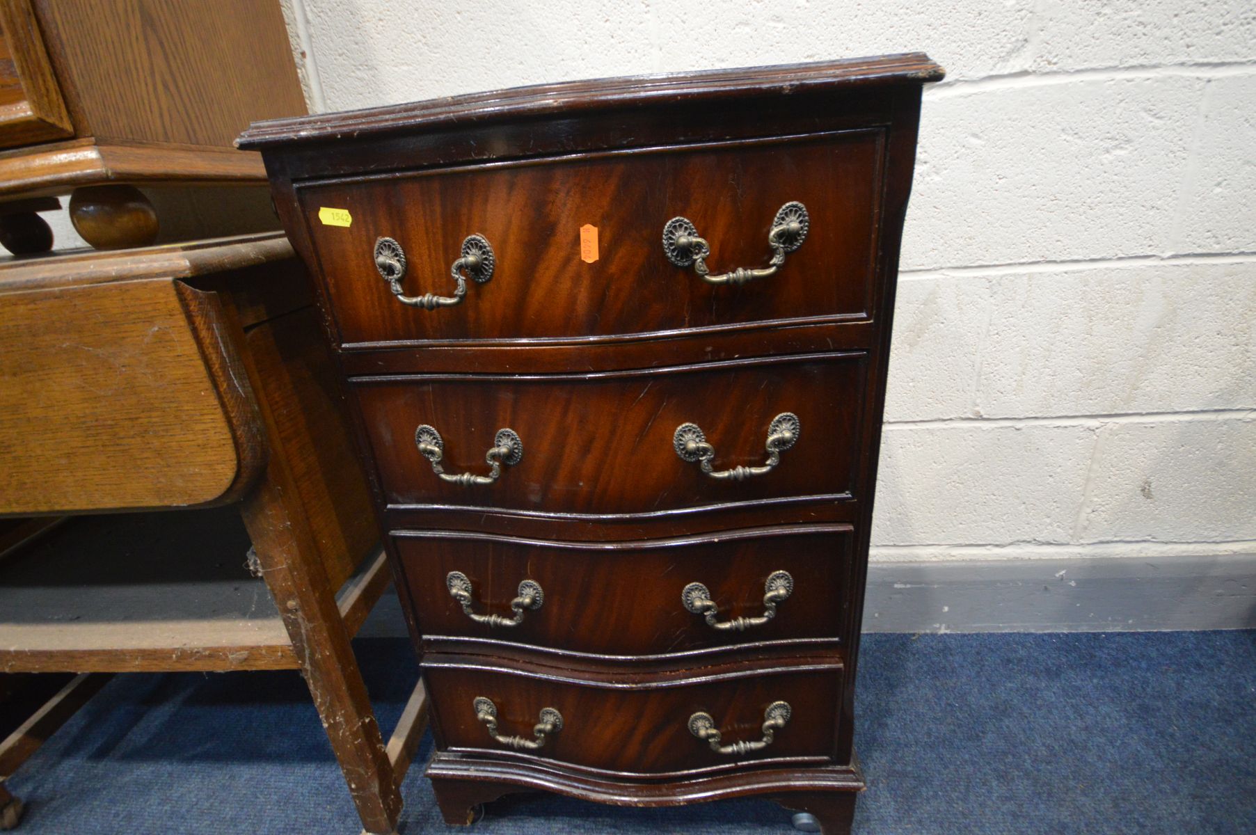 A MAHOGANY CHEST OF FOUR DRAWERS, along with an oak drop leaf tea trolley, German oak bedside - Image 2 of 3