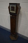 AN ART DECO OAK GRANDDAUGHTER CLOCK, on a later hexagonal plinth, height 128cm