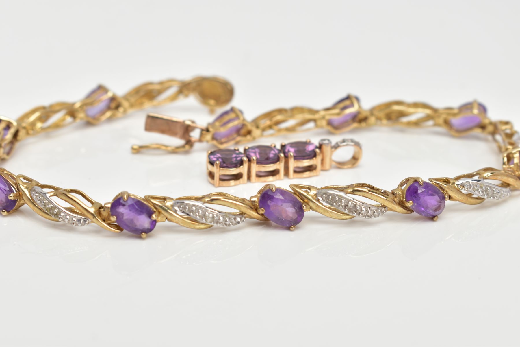A 9CT GOLD AMETHYST AND DIAMOND LINE BRACELET AND PENDANT, the line bracelet set with ten oval cut - Image 3 of 5