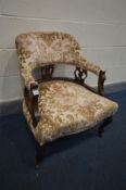 AN EDWARIAN MAHOGANY TUB CHAIR