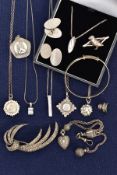 A SELECTION OF SILVER AND WHITE METAL JEWELLERY, to include a silver Victorian pendant of a circular